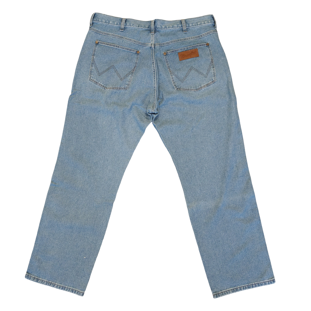 Light blue denim jeans on a white background