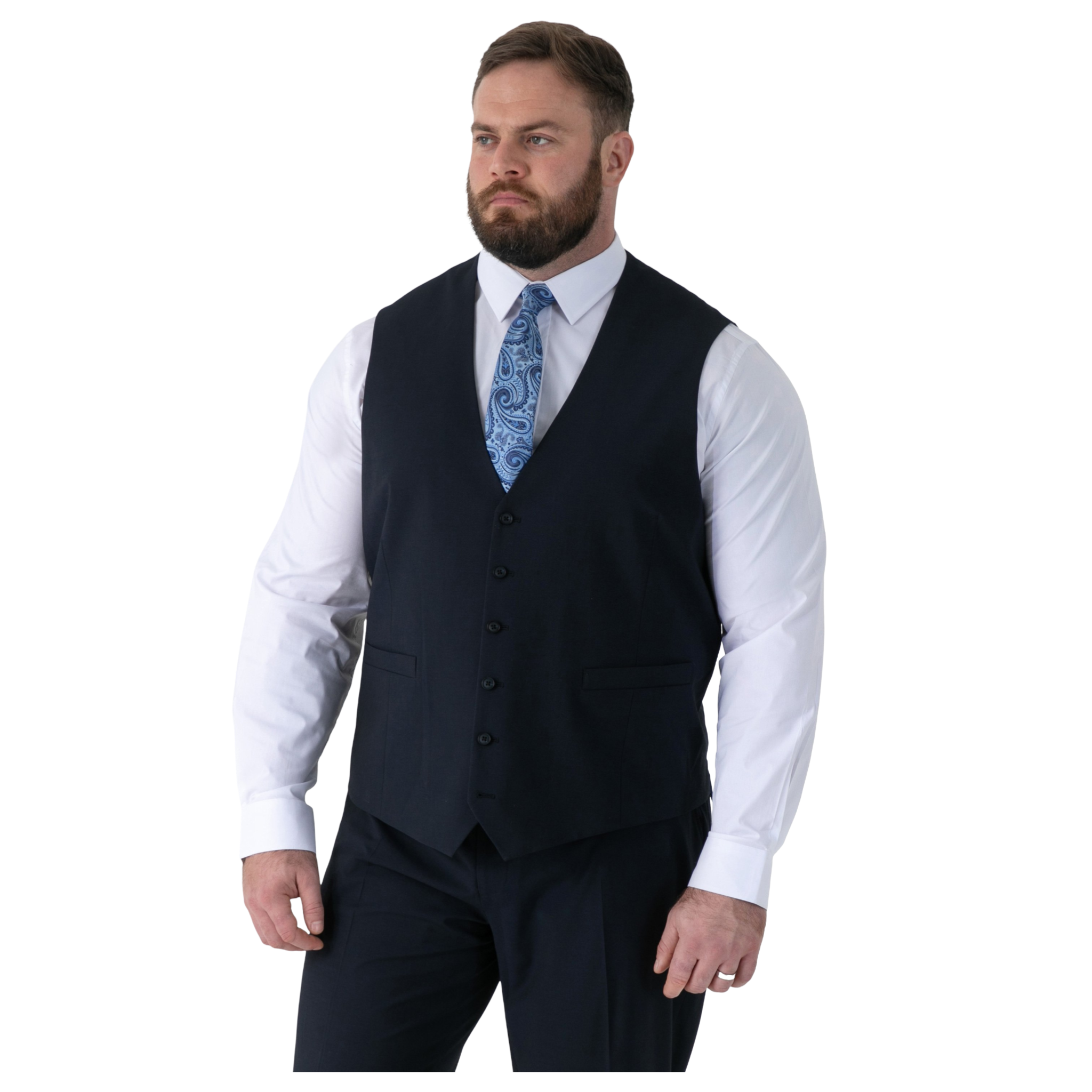 Man wearing a navy vest over a white shirt with a blue patterned tie on a white background