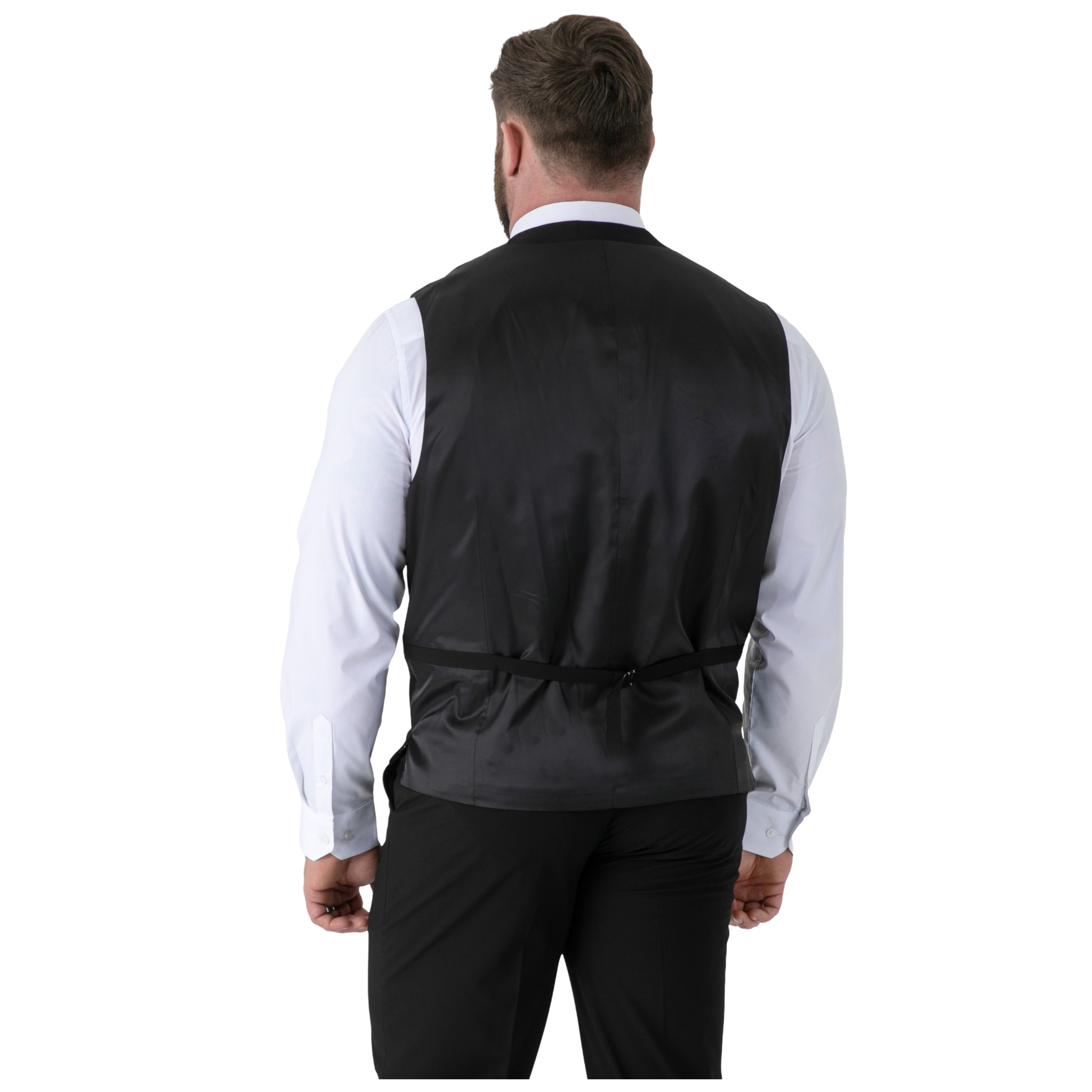 Man wearing a black waistcoat over a white shirt on a white background